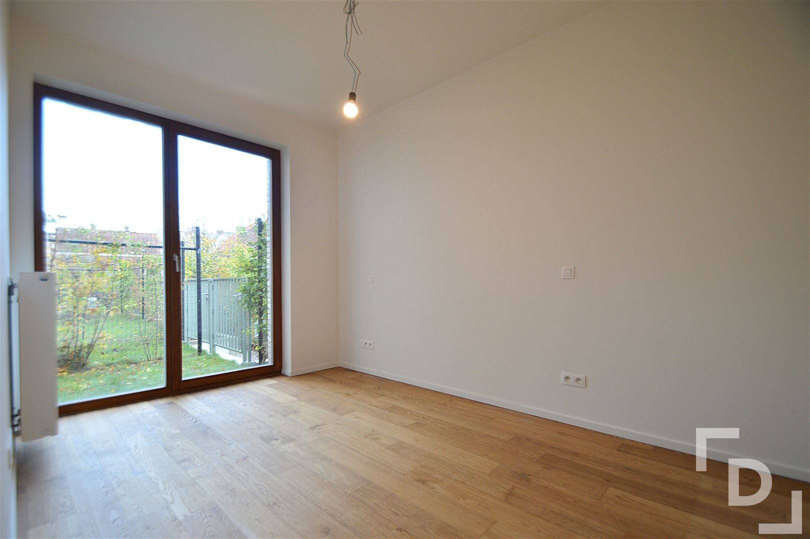 Gelijkvloers appartement met tuintje. foto 7