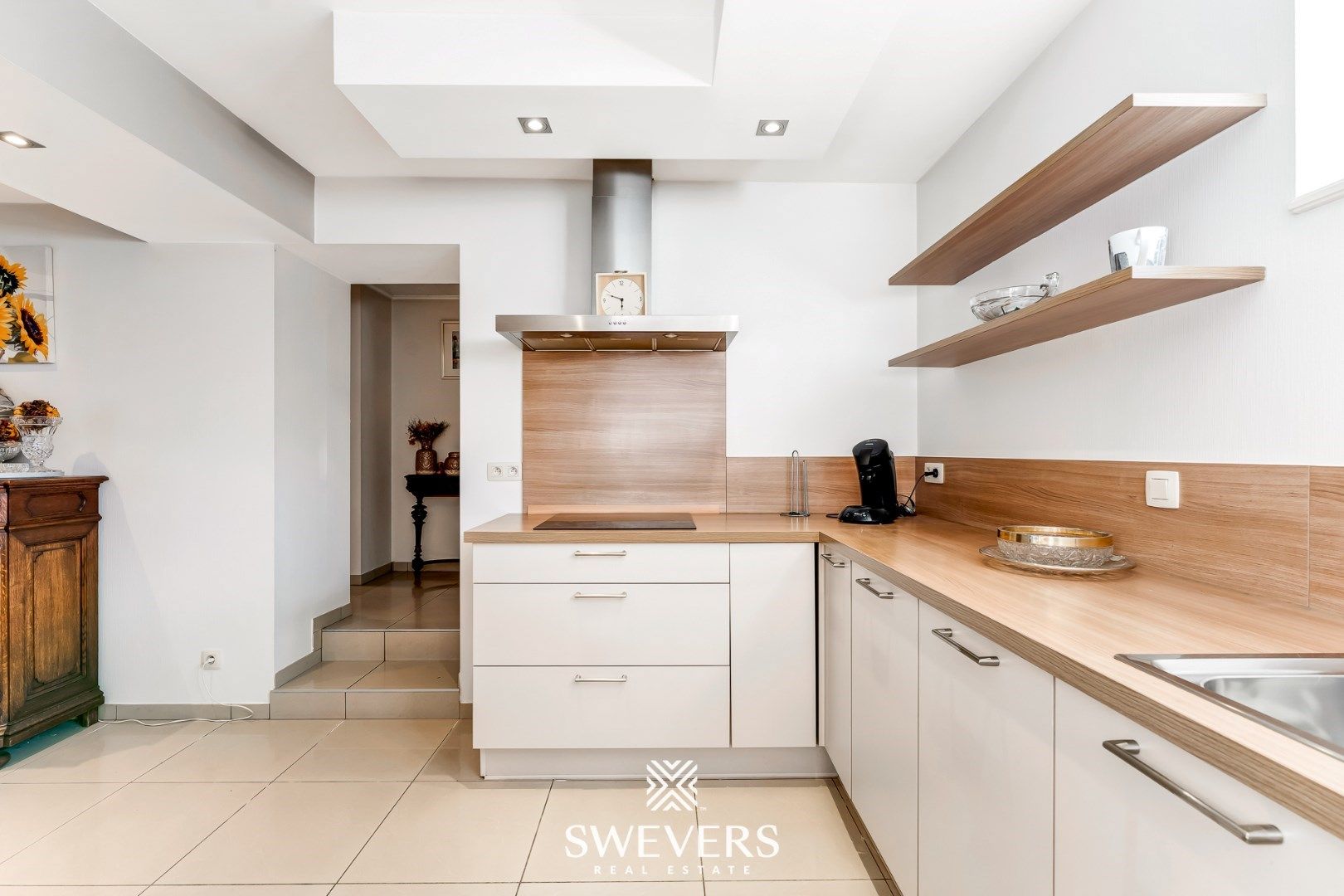 Instapklare woning met handelszaak en appartement in Geetbets foto 18