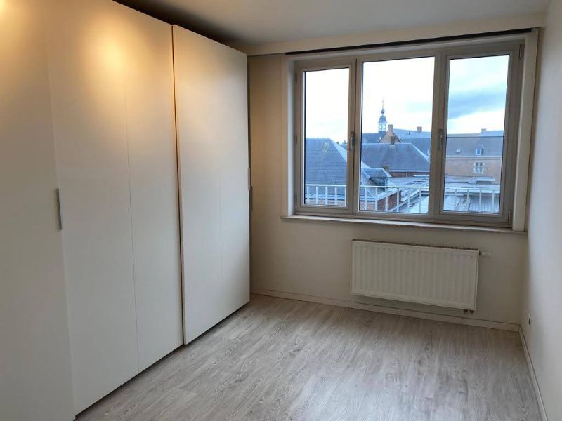 Ruim (±100m²) app met 2 slpk en autostaanplaats in hartje Geel foto 13