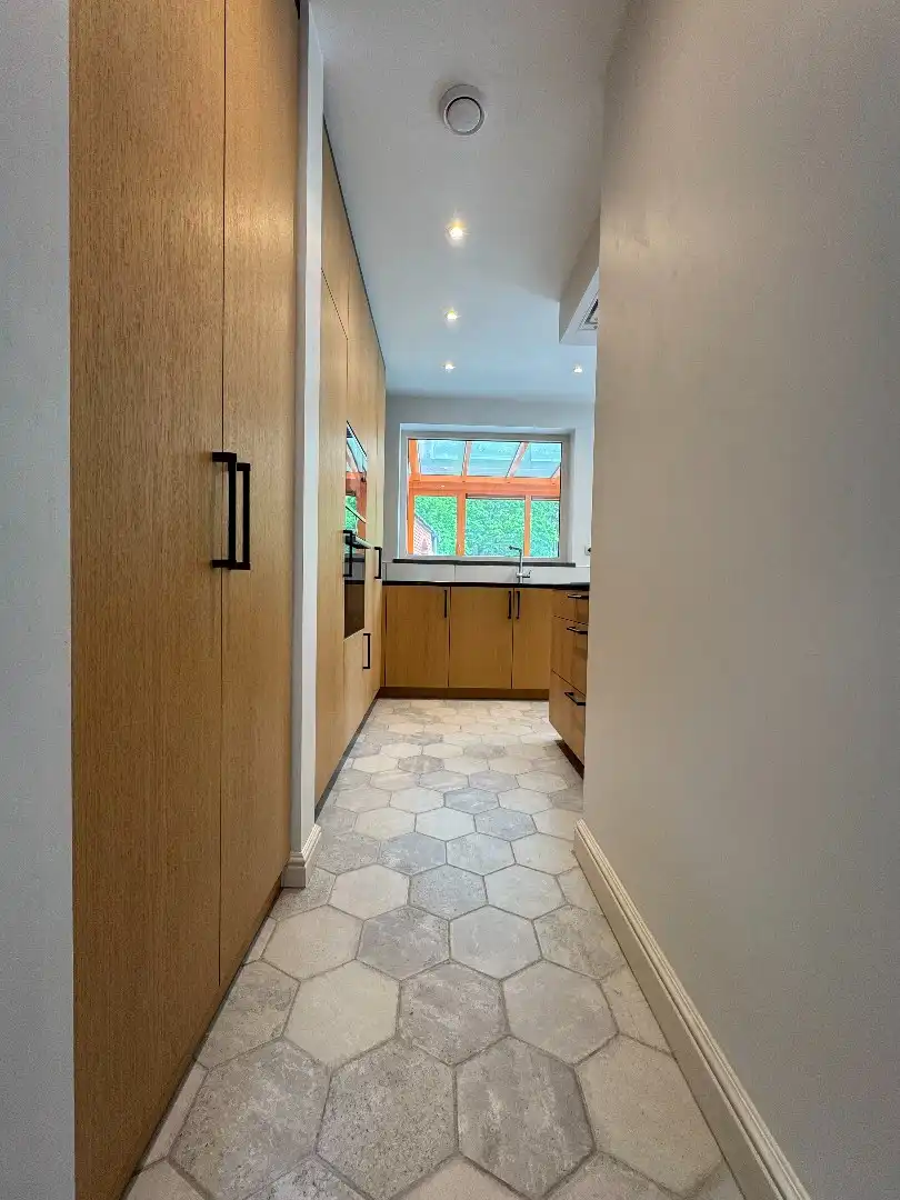 Een 4-gevelwoning met garage en  tuin foto 7