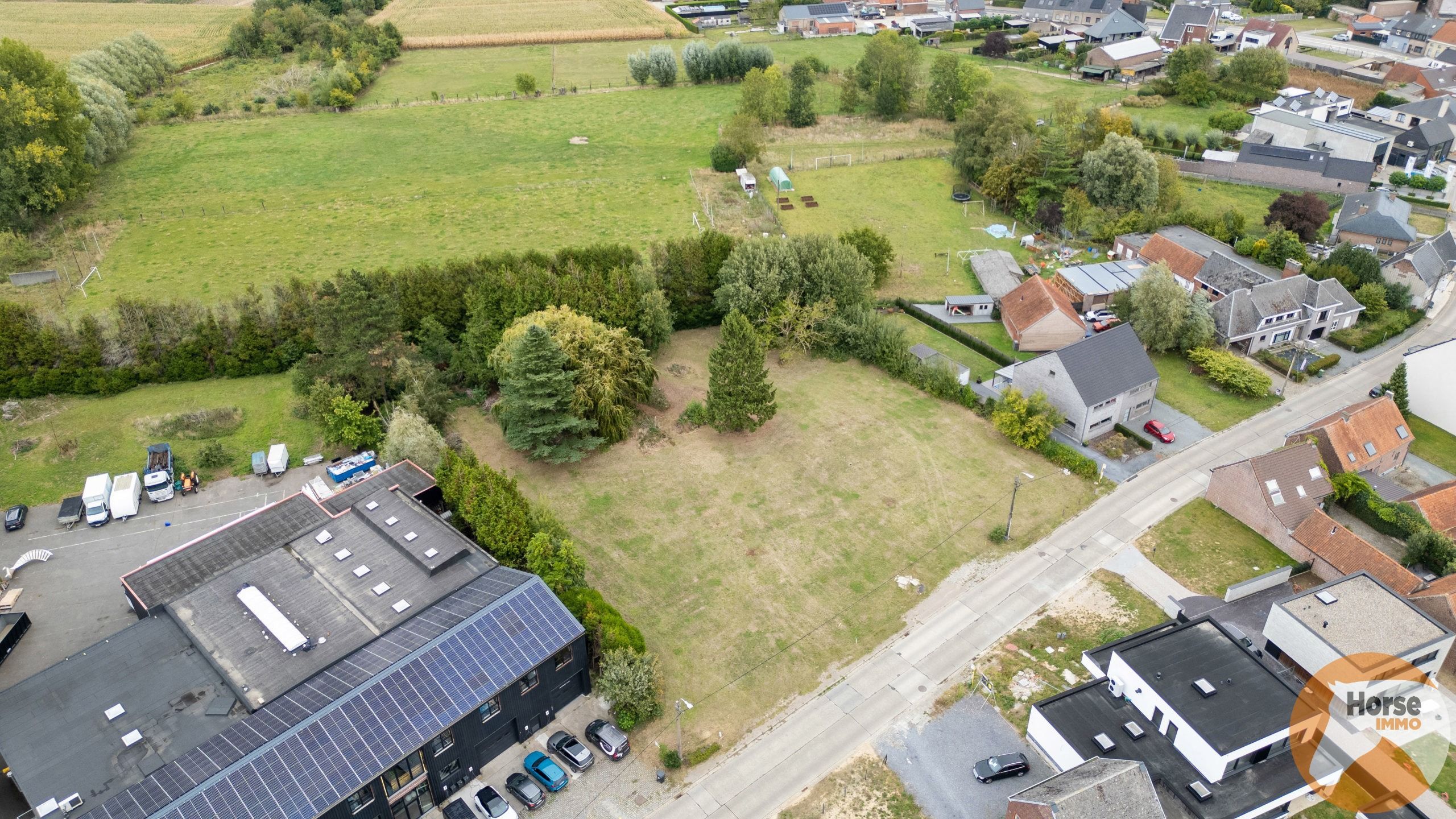 BAVEGEM- Bouwgrond (lot 1) voor halfopen bebouwing met weide foto 2