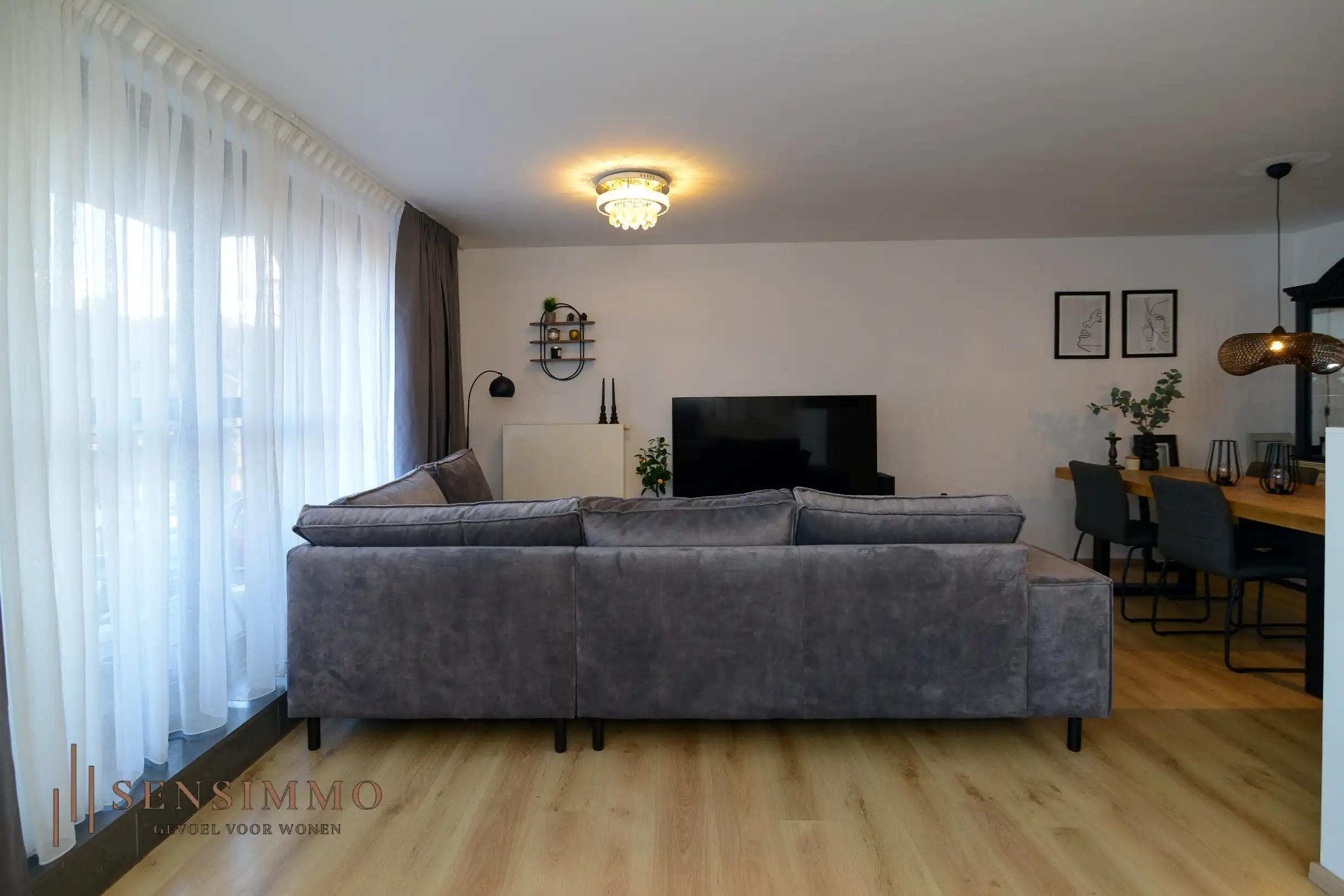 Instapklaar 2-slaapkamerappartement met dubbele terrassen en garagebox in hartje Eisden foto 5