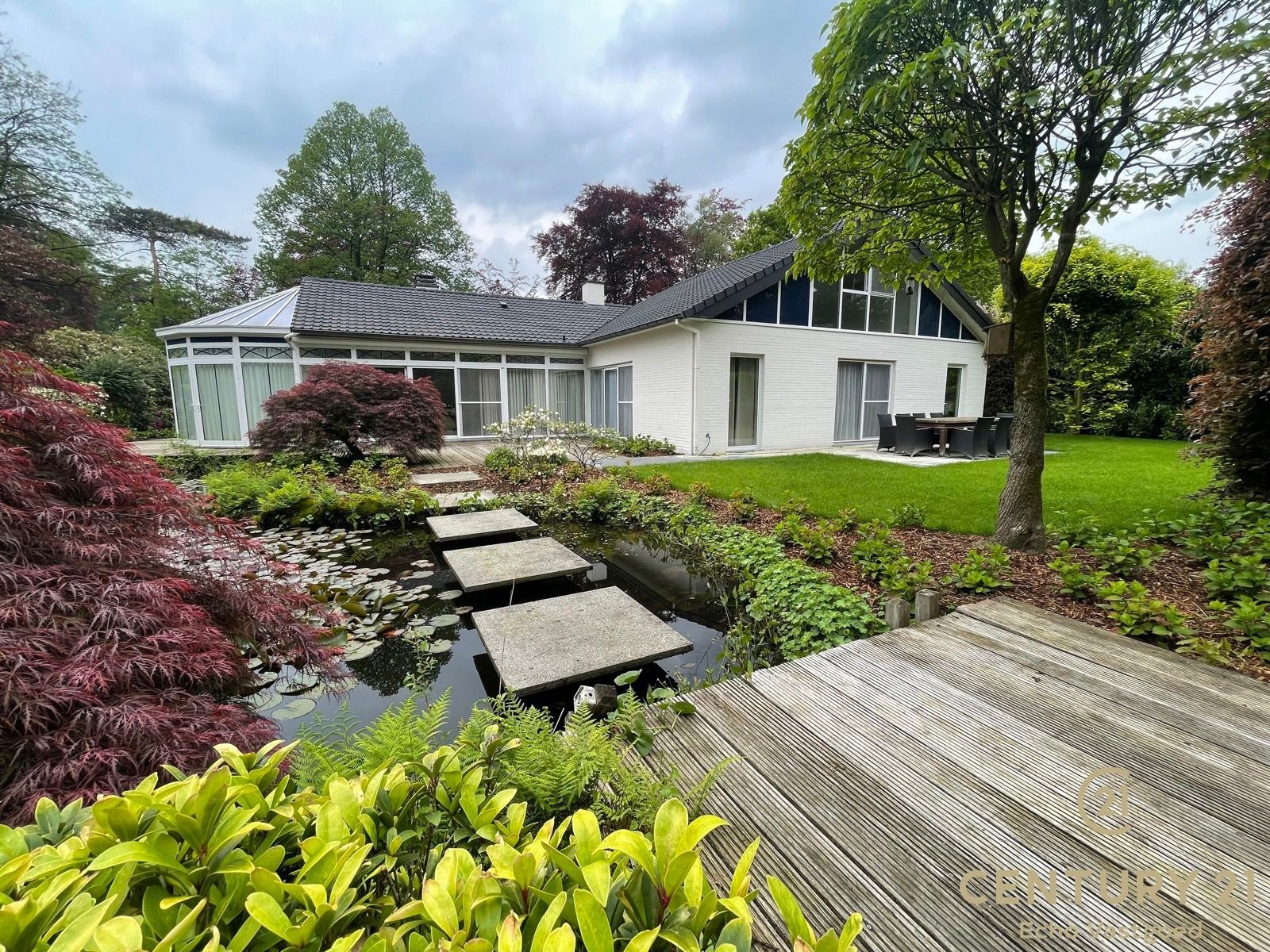 Gelijkvloerse fraaie villa met prachtige tuin op ca 1700m² foto 31