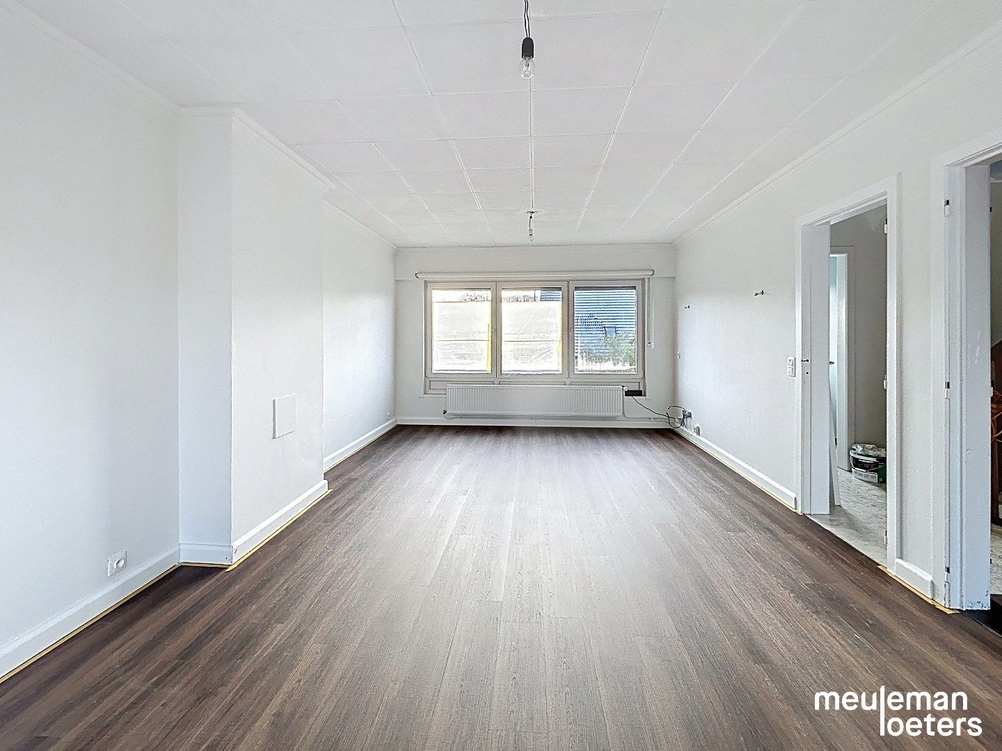 Halfopen gezinswoning met garage en tuin foto 3