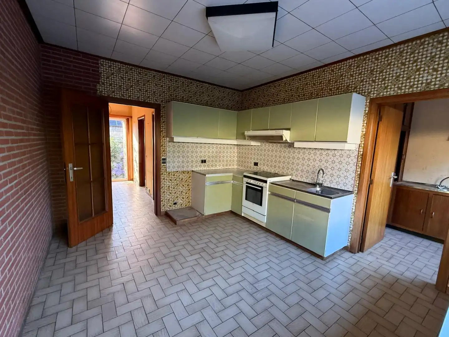 Eengezinswoning met 3 slaapkamers, garage, terras en ruime tuin foto 5