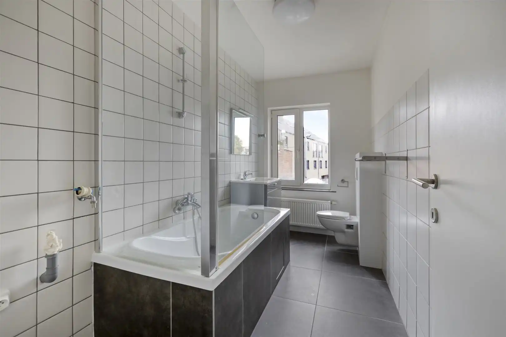 TE KOOP: Duplex-appartement (3slpks) met kantoorruimte of handelsruimte op topligging in Genk! foto 9