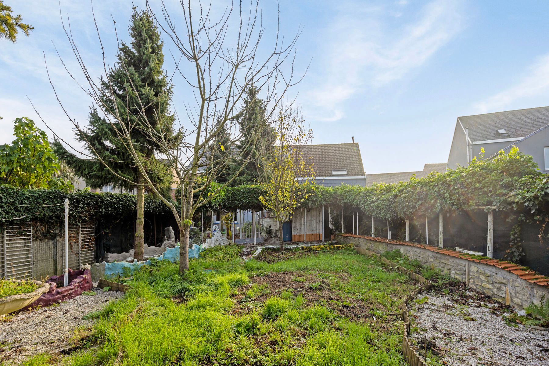 Gezinswoning met 5 slaapkamers, ruime garage en grote tuin foto 21