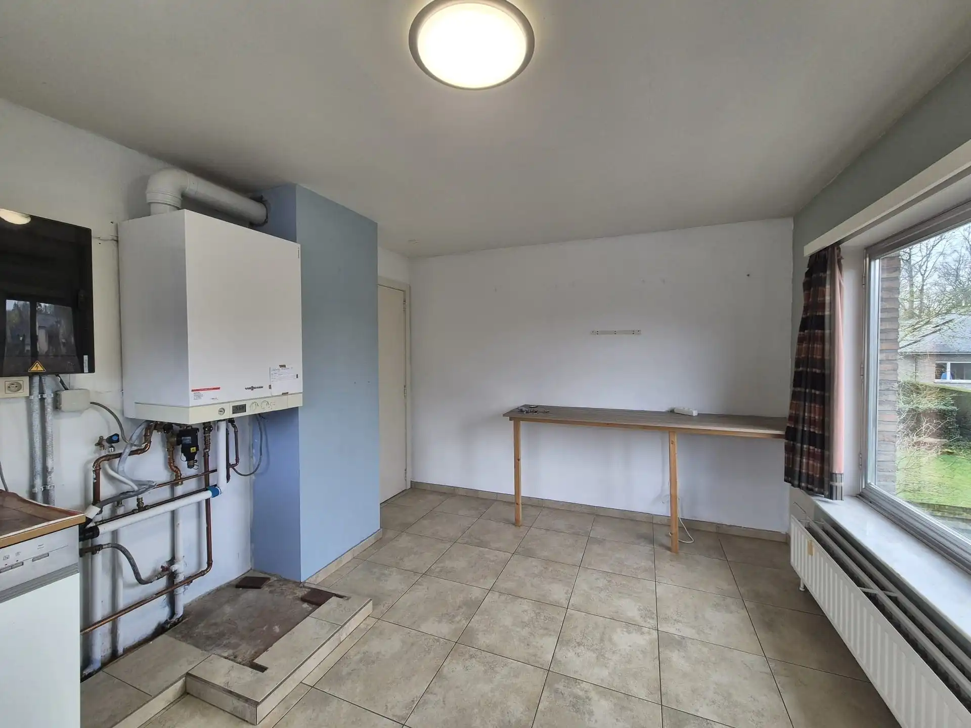 Centraal gelegen ruim appartement met groot zongericht terras en garage. foto 11