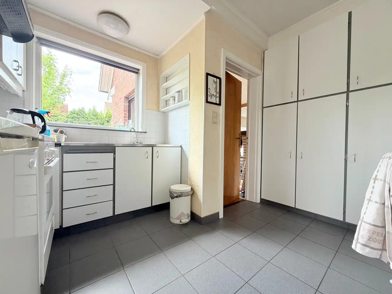 Op te frissen alleenstaande woning met riante tuin foto 11