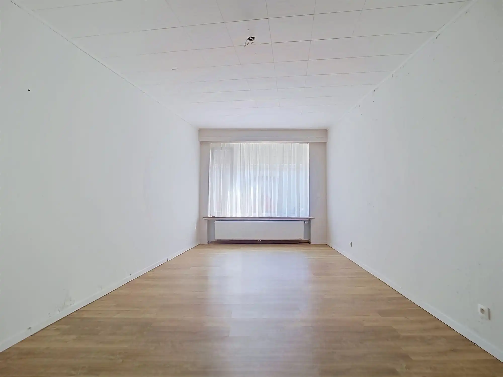 Gelijkvloers appartement met 2 slaapkamers, polyvalente ruimte en garage foto 11
