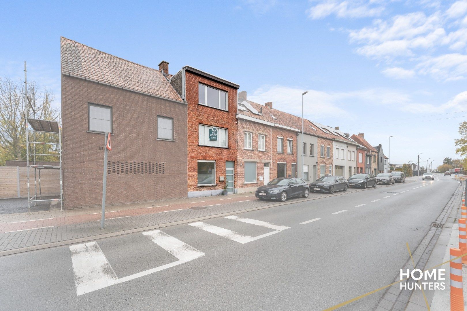 Charmante, op te frissen rijwoning met ruime tuin en 3 slaapkamers foto 2