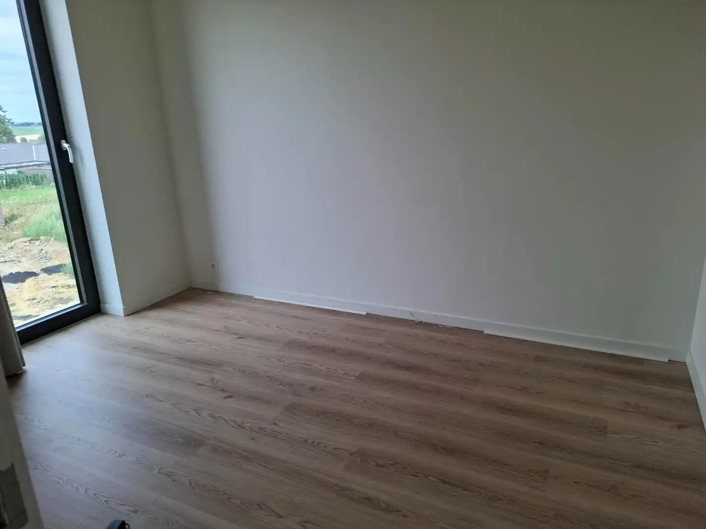 Ruim lichtrijk 3 slaapkamerappartement met terras, parking en berging inbegrepen foto 7
