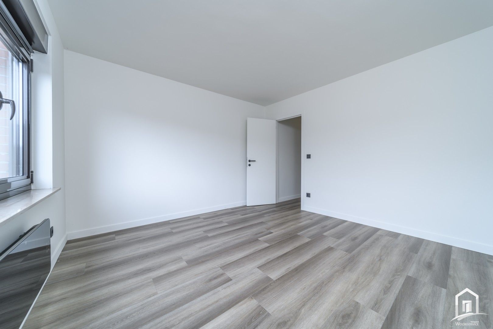 Totaal gerenoveerd gelijkvloers-appartement met tuintje foto 20