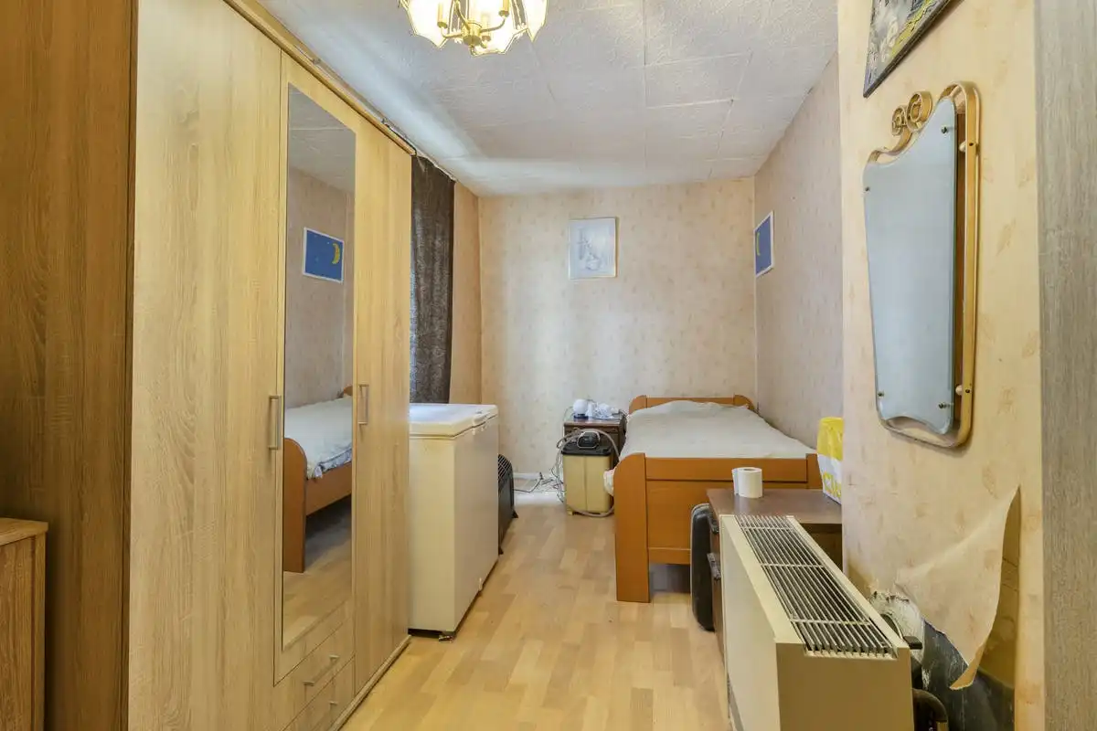 Opbrengsteigendom met renovatiepotentieel in Anderlecht foto 25