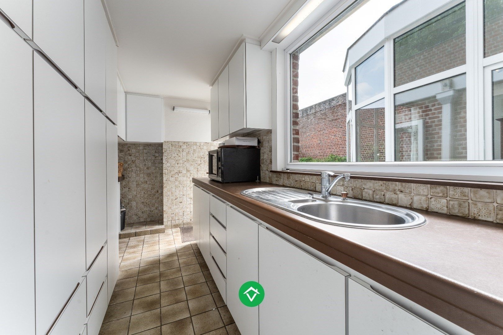 Ruime woning met 7 slaapkamers en loods (320m²) in centrum Roeselare foto 11