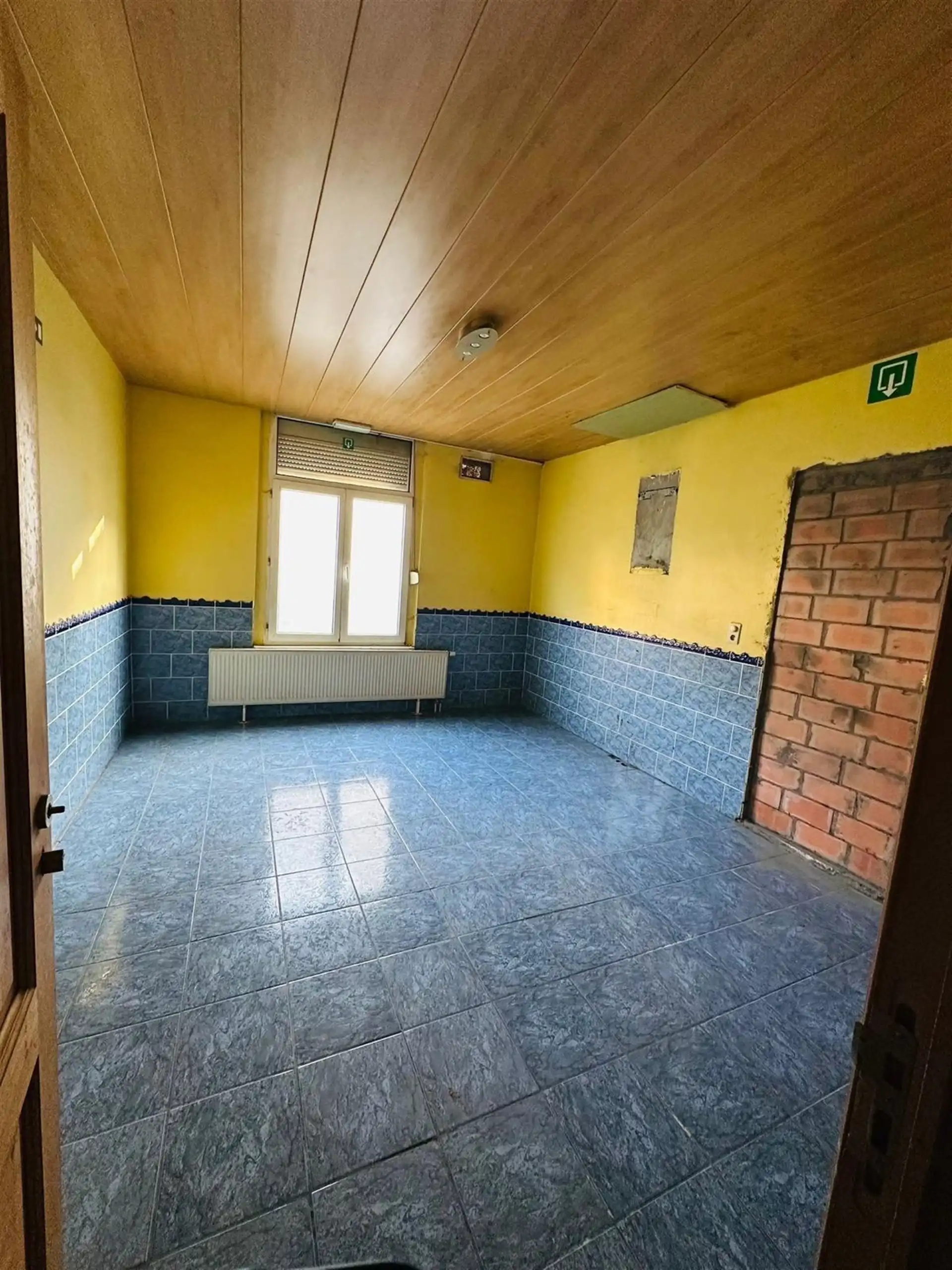 Te renoveren woning met veel potentieel in Berchem!  foto 4