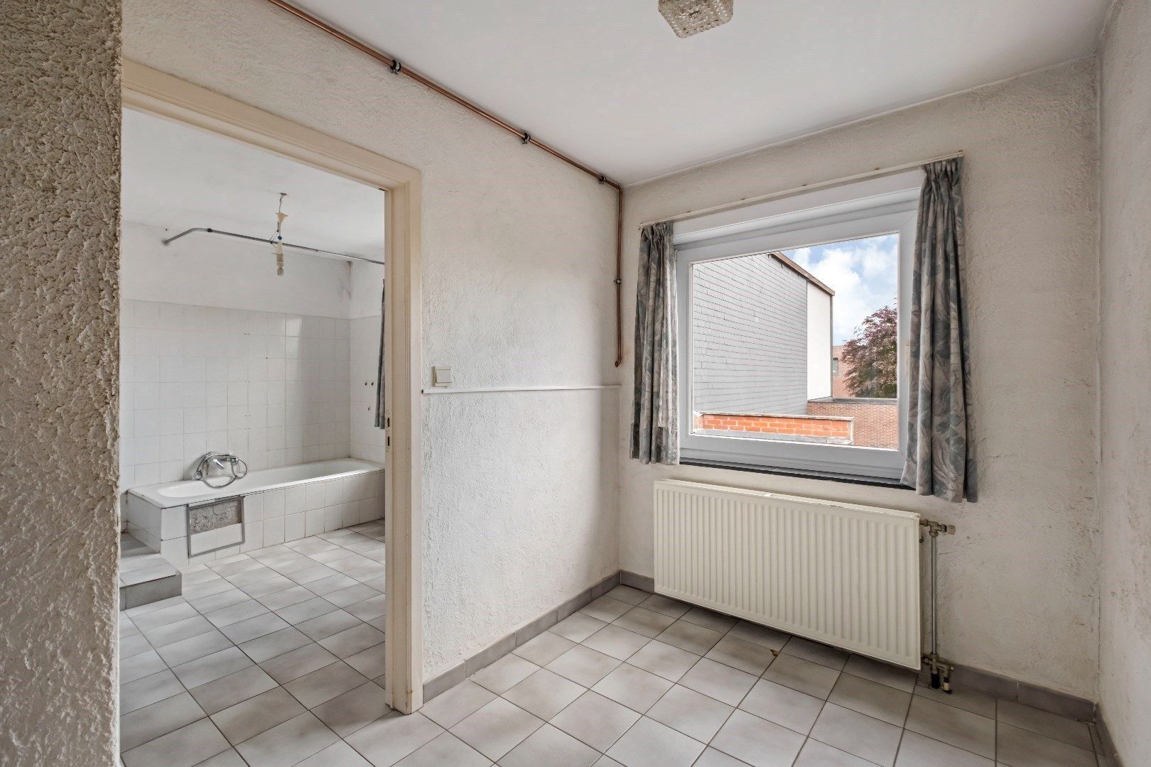 Woning met 4 slaapkamers, tuin en garage in Dadizele-centrum foto 11