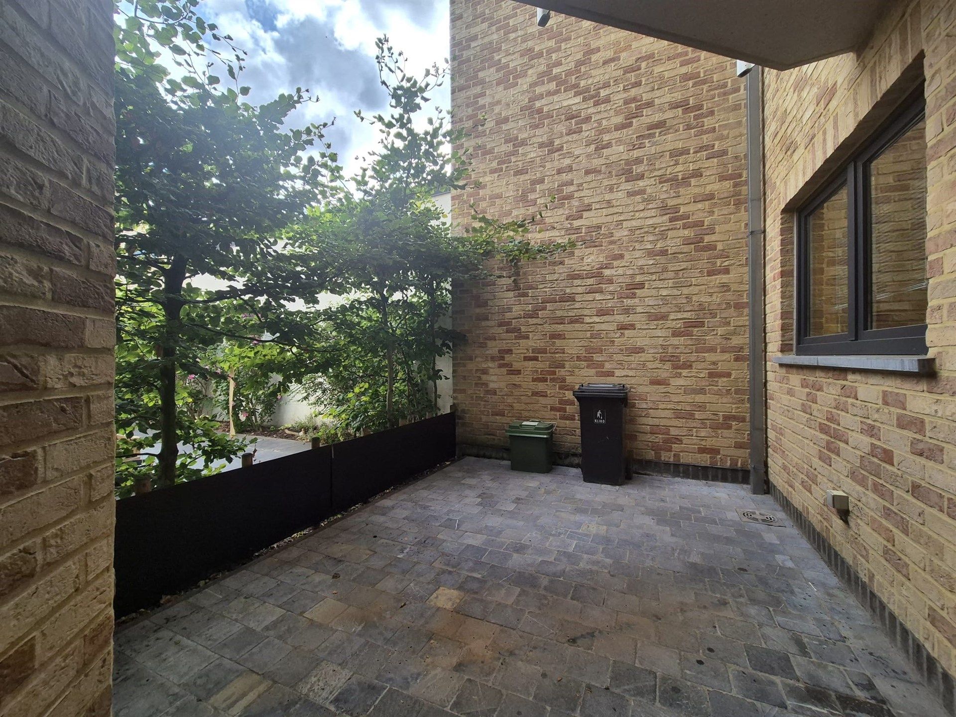 Gunstig gelegen gelijkvloers 1-slaapkamerappartement in Heusden foto 12