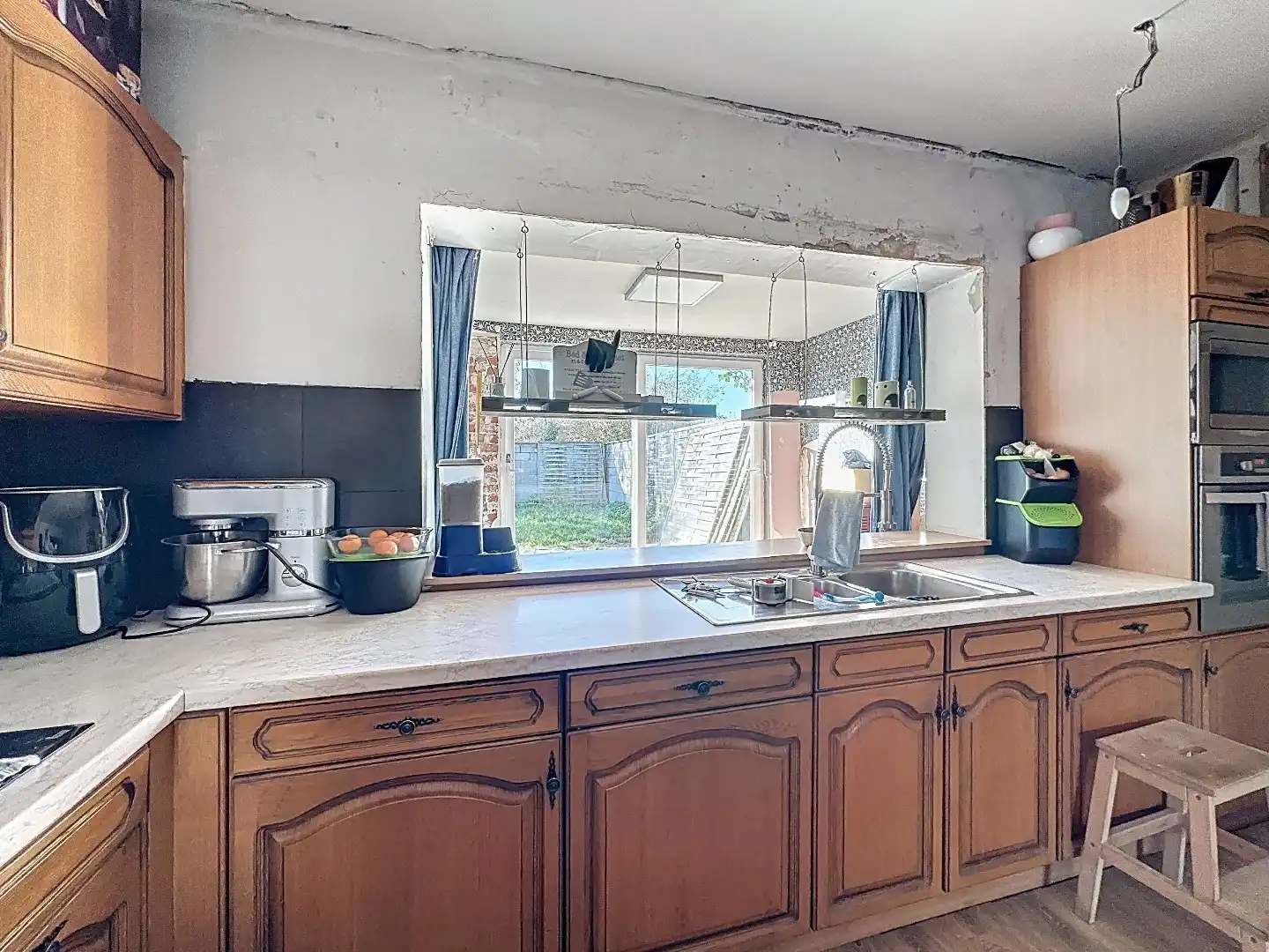 Ruime Gezinswoning met Zonnige Tuin en Renovatiepotentieel foto 6