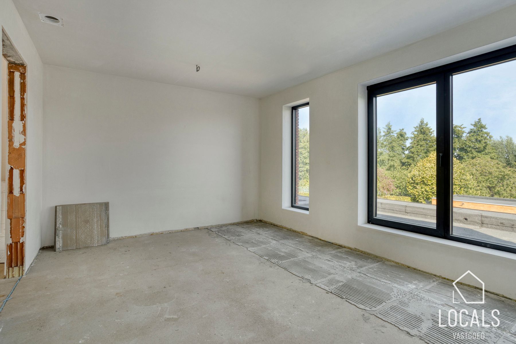 Ruime triplex-woning met 4 slaapkamers en 2 badkamers foto 12