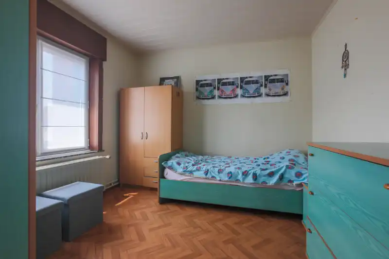 Handelspand (winkel) met woonst en magazijntje van +/- 130m². foto 13