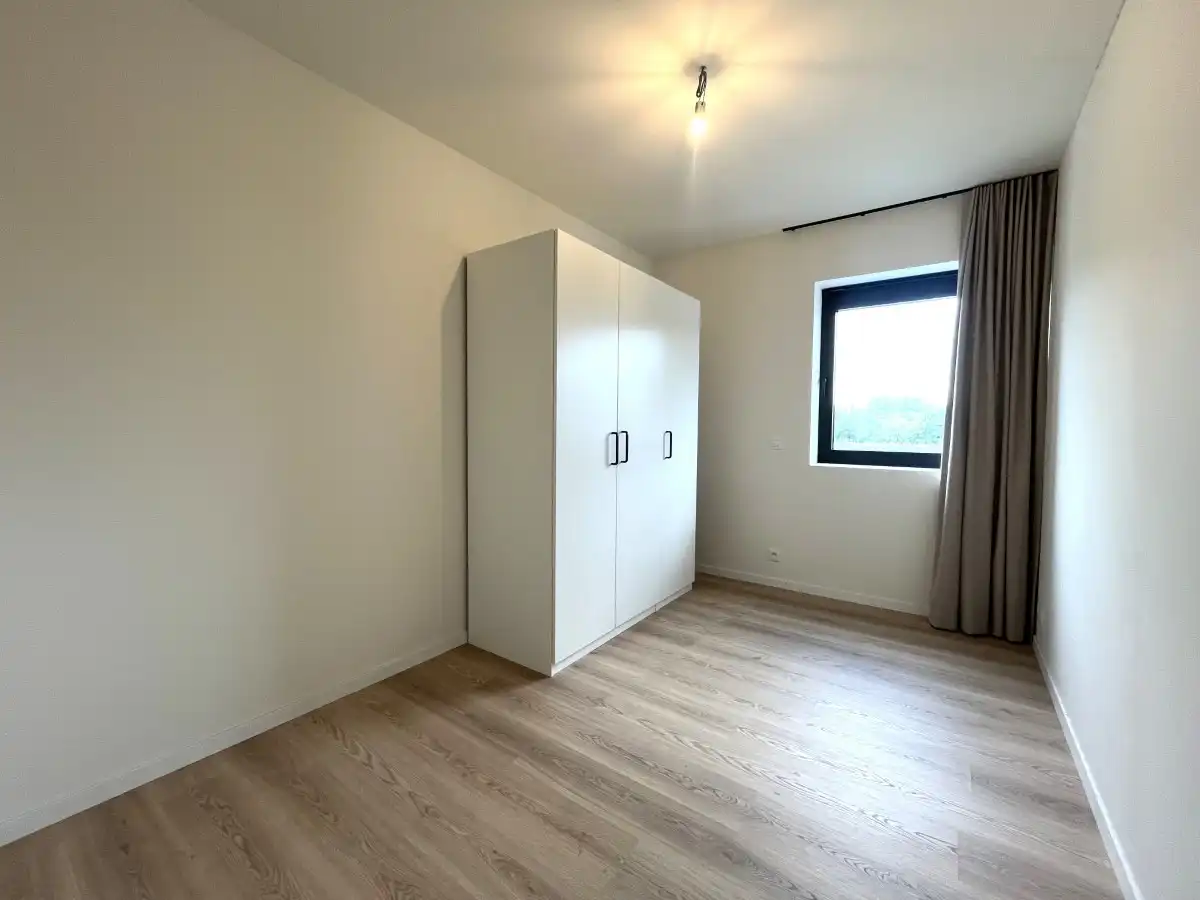 Zonnebeke – Instapklaar nieuwbouwappartement met terras en private parkeerplaats nabij het Kasteelpark foto 8