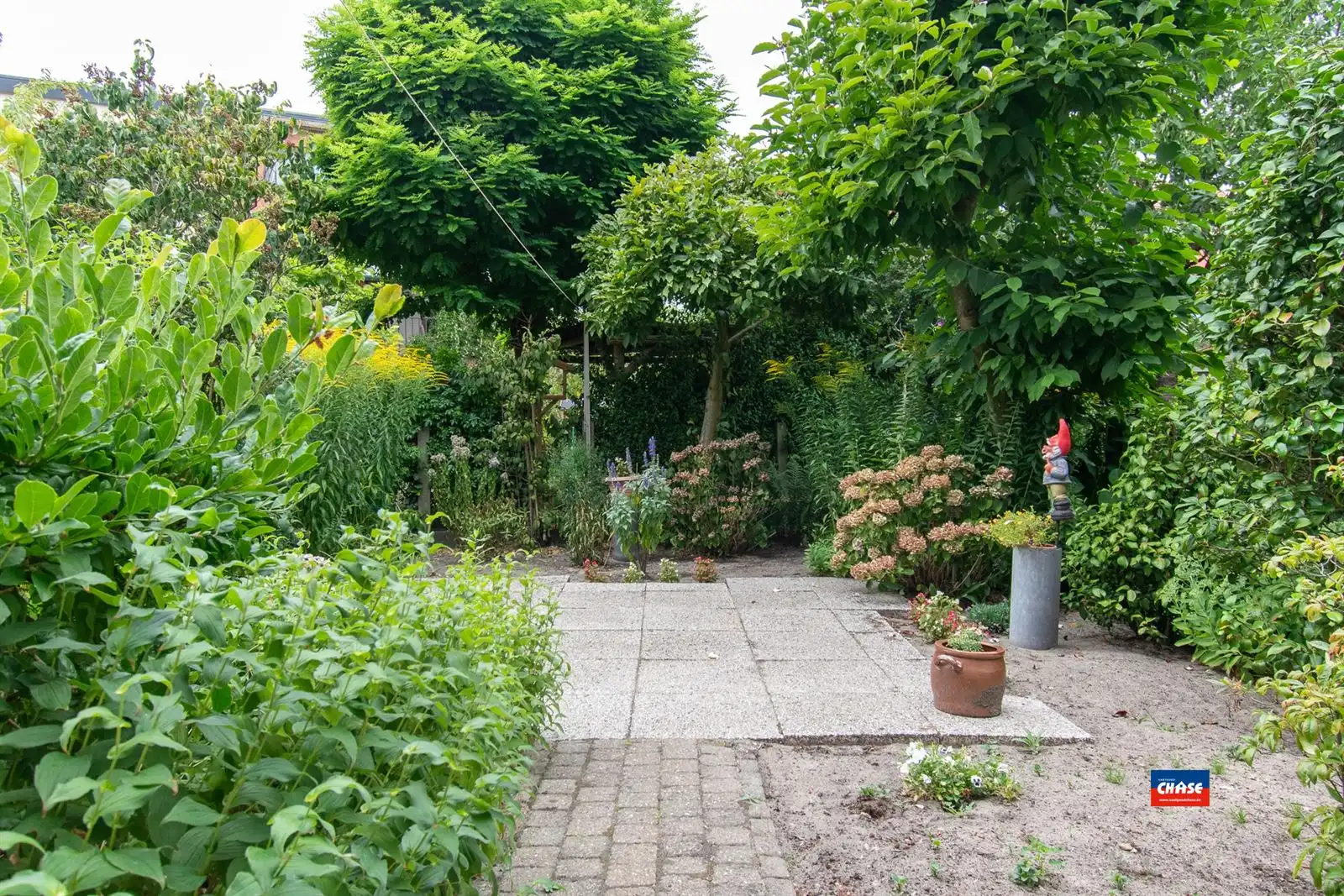 Bel-étage met drie slaapkamers en tuin foto 20