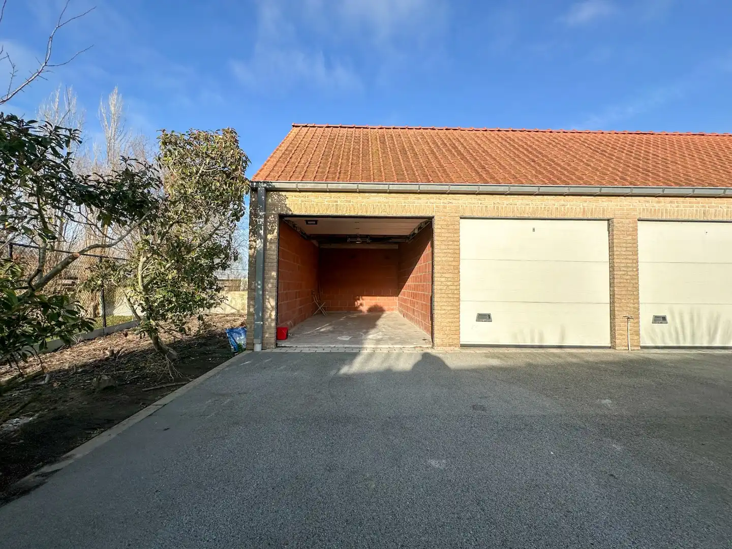 Lichtrijk gelijkvloers appartement met 2 slpk, garage en autostandplaats foto 26