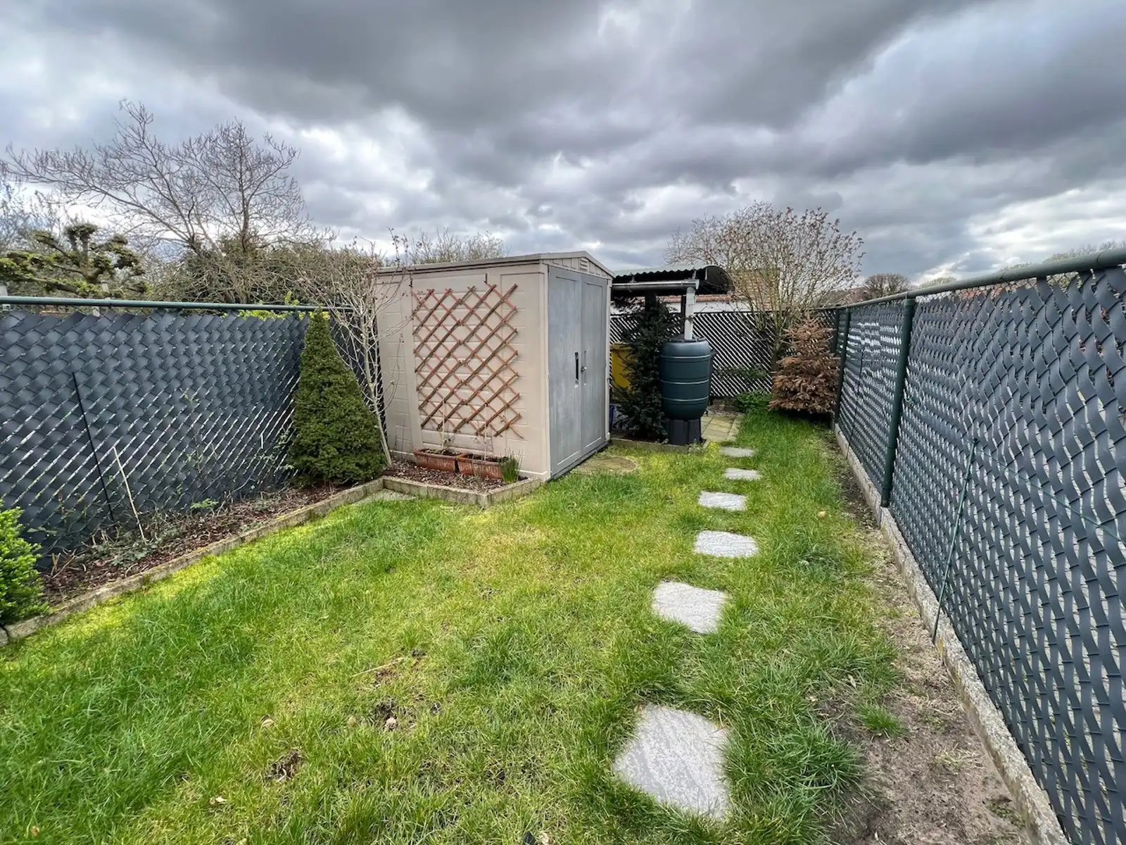 GLV app met 2 slpk, terras, tuin, parking en garagebox foto 12