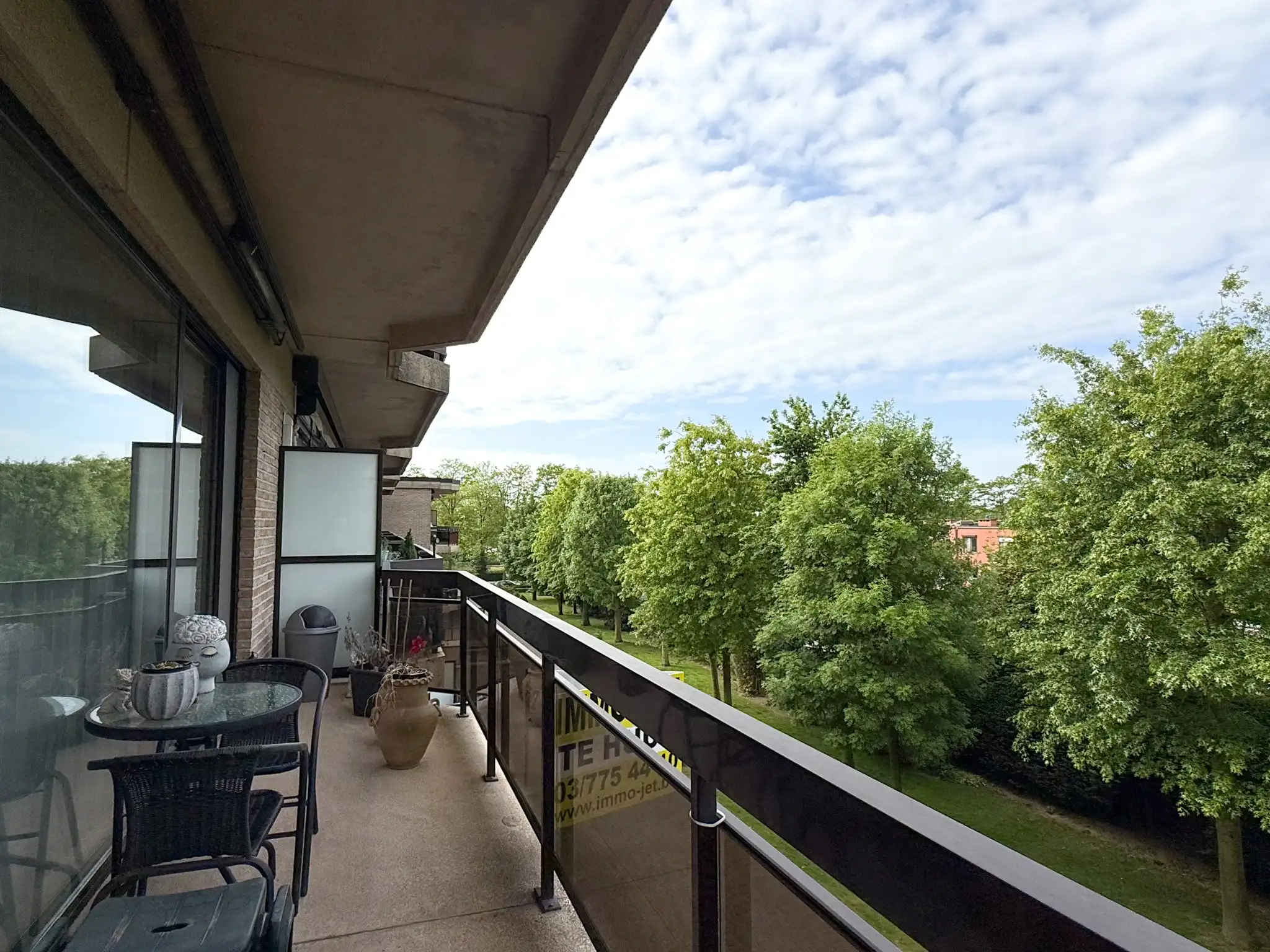 Appartement met twee slaapkamers, twee terrassen en garage in het hartje van Beveren foto 7
