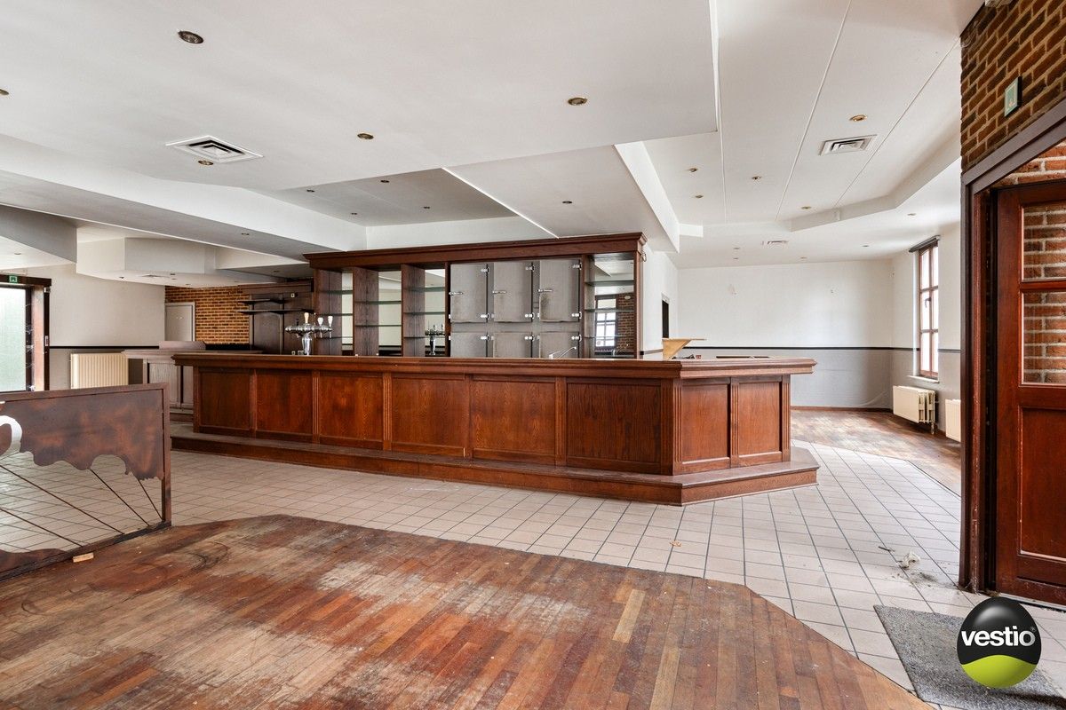 Handelspand met woonst / projectopportuniteit aan de Luikersteenweg. foto 4