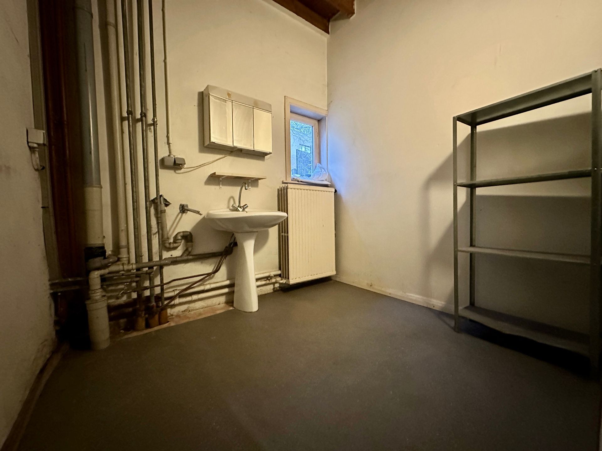 Ruime, te renoveren woning te Rotselaar foto 9