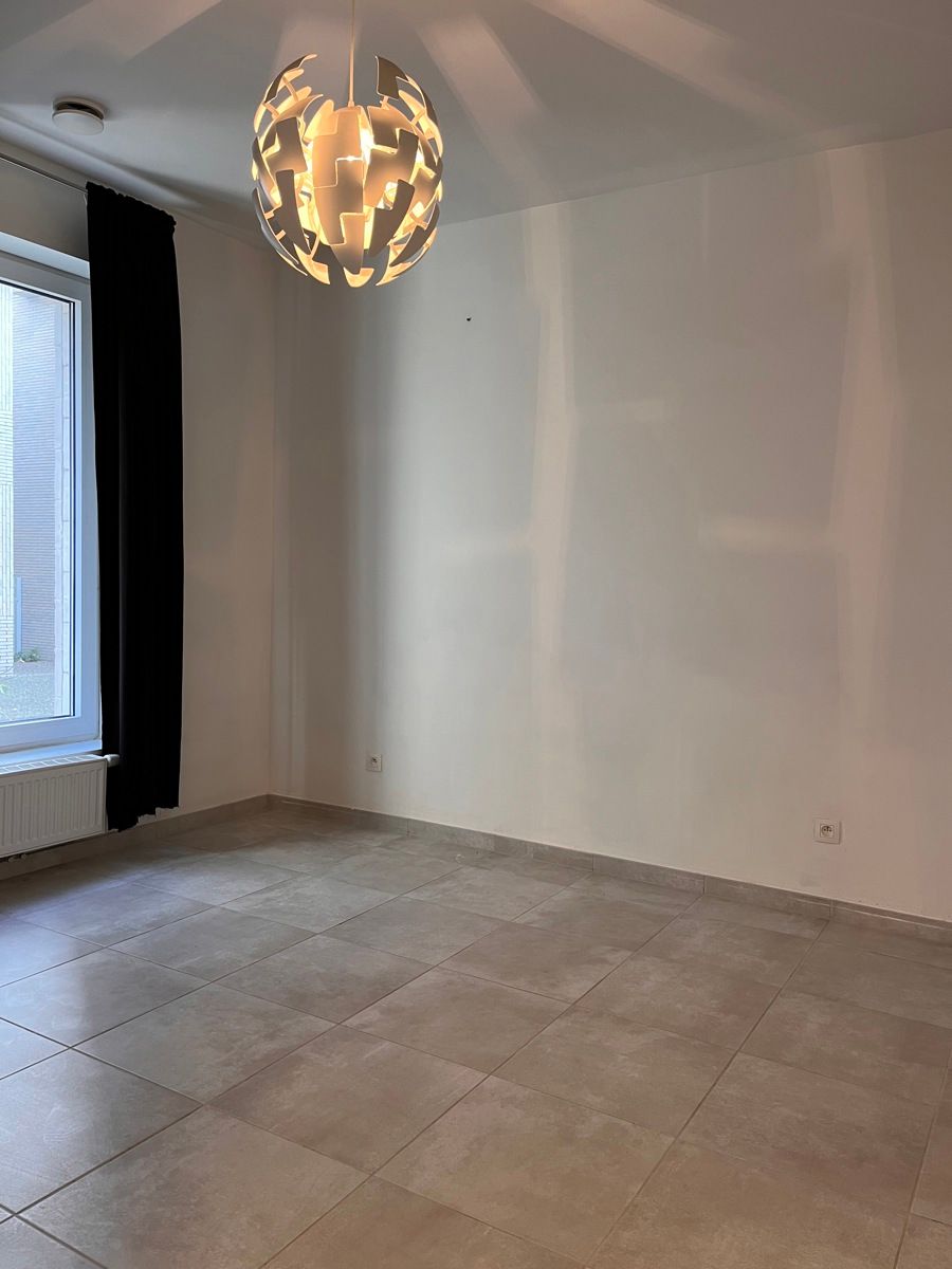 Gelijkvloers appartement te huur + garage foto 11