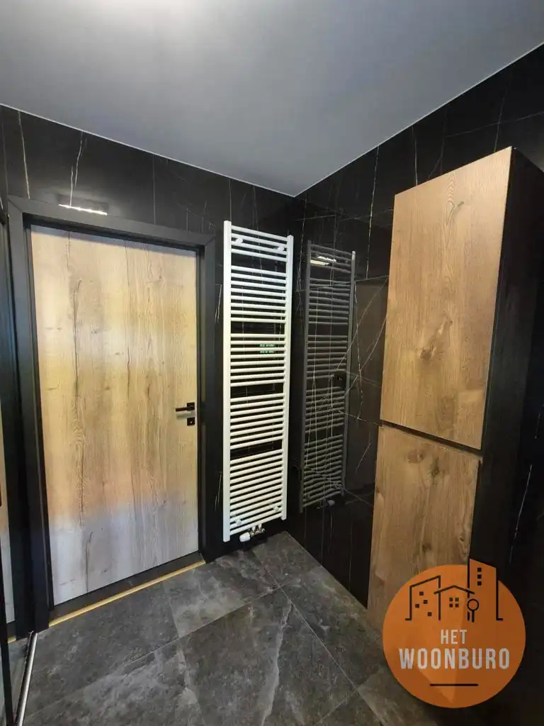 Instapklare woning met grote tuin en garage, rustig gelegen foto 12