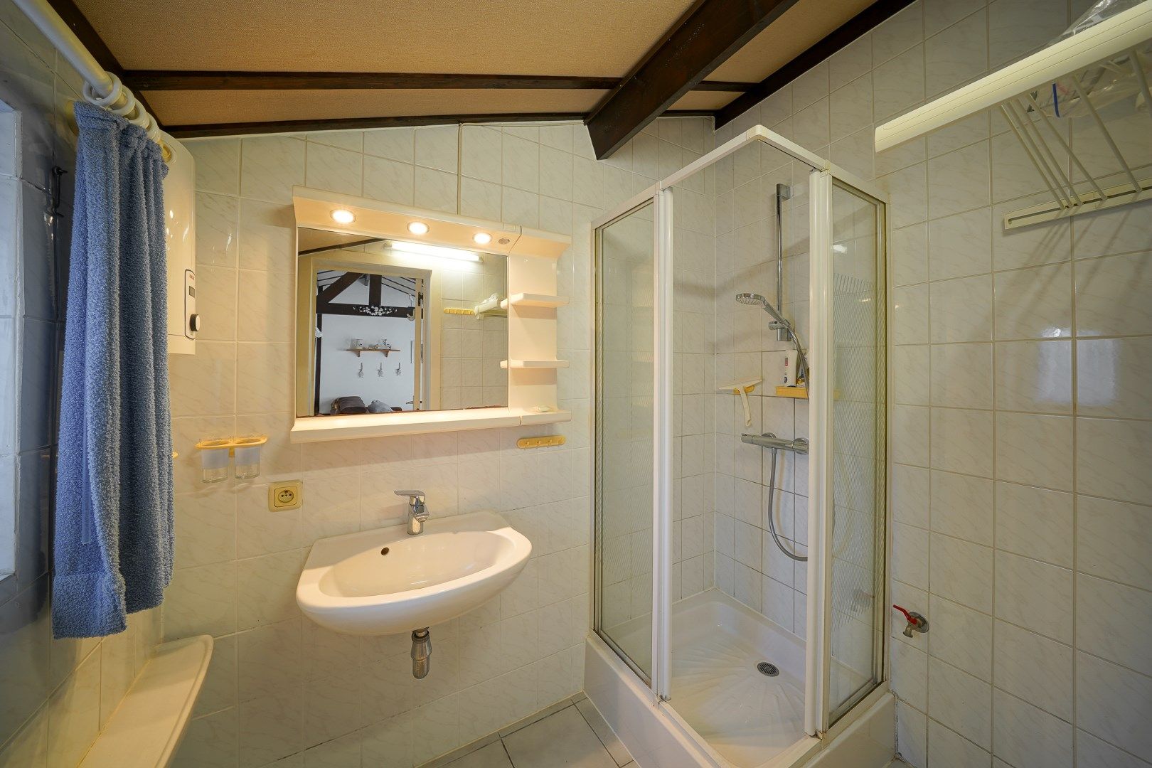 Instapklare vakantiewoning met zonnige tuin en 2 slaapkamers foto 11