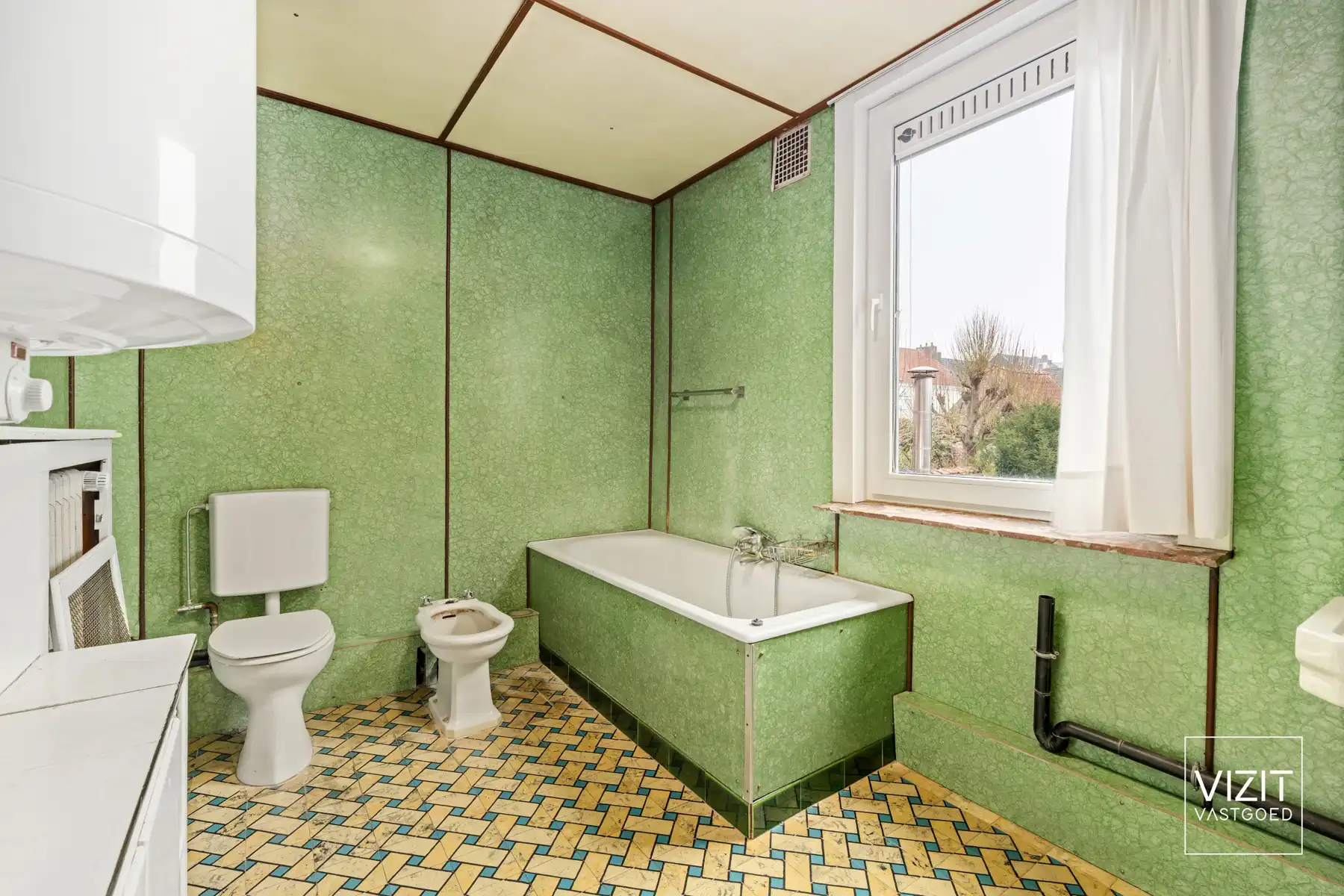 Karaktervolle stadswoning met tuin en garage! foto 15