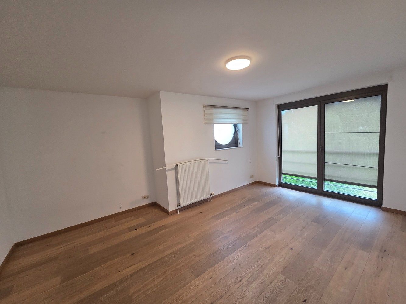 Clusterwoning met 4 ruime slaapkamers, tuin en 2 ondergrondse staanplaatsen. foto 17