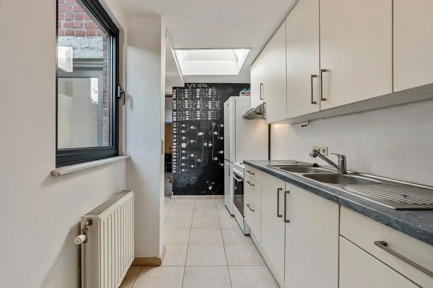 Goed gelegen woning met 4 slaapkamers en een terras nabij het UZ Gasthuisberg te Leuven! foto 8