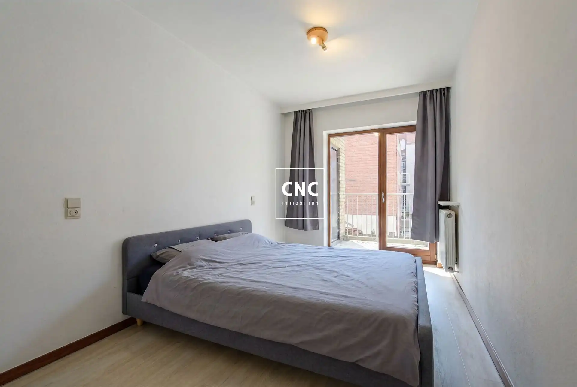 Ruim en lichtrijk 2-slaapkamerappartement op de Lippenslaan foto 10