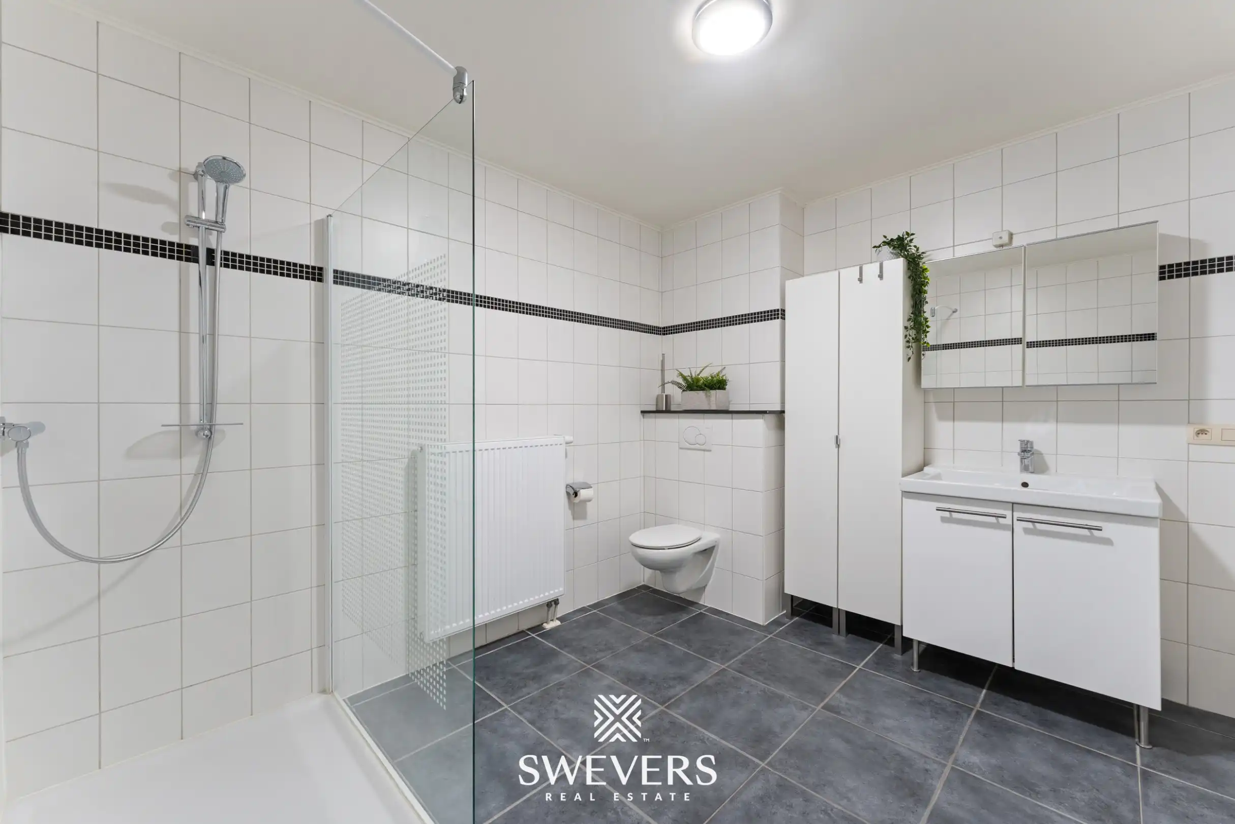 Ruim instapklaar appartement met 3 slaapkamers, zonnig terras en ondergrondse parking te Genk (EPC: A) foto 17