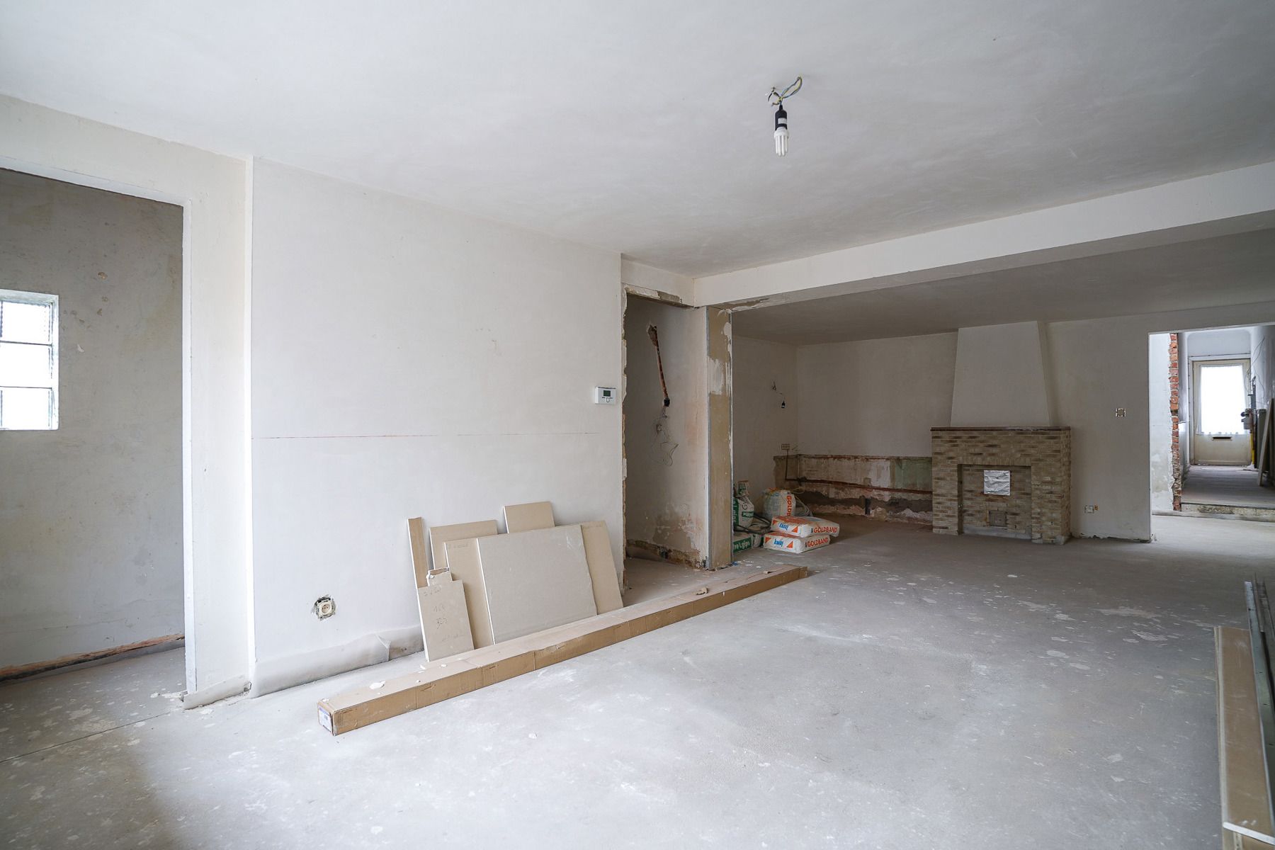 2 aansluitende, op te frissen woningen met loods in Buggenhout foto 18