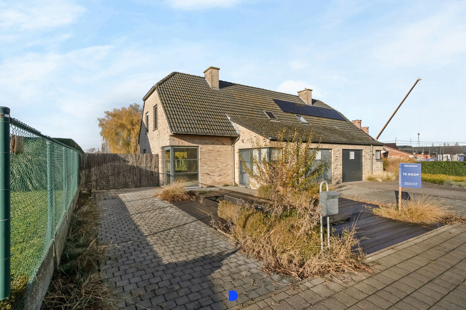 Hoofdfoto van de publicatie: Halfopen woning met tuin in Oekene!