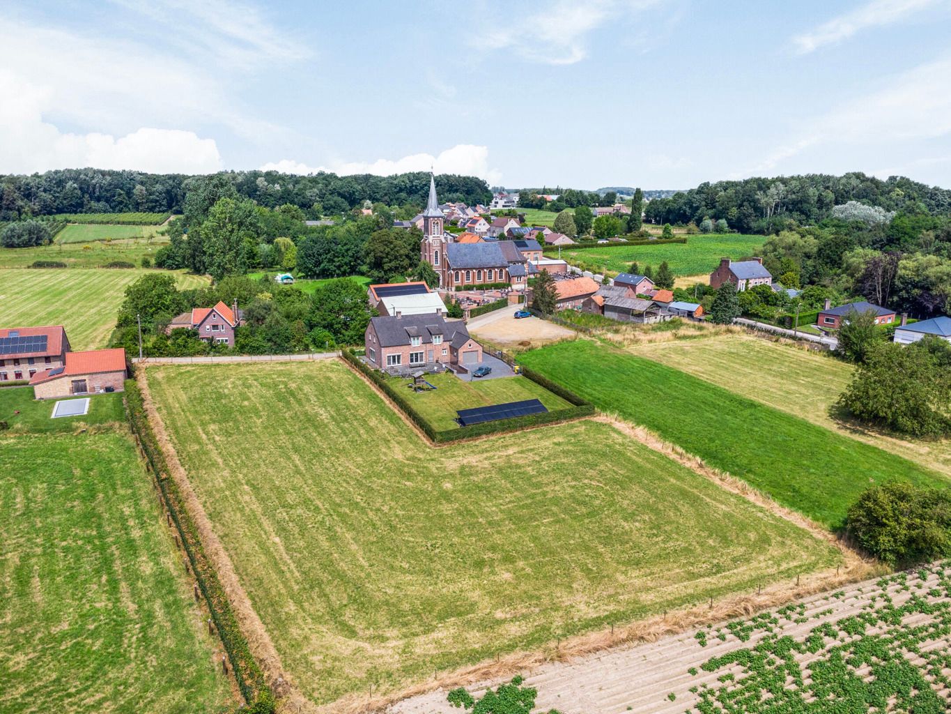 Bouwgrond voor een open bebouwing met weiland in Kortenaken foto 2