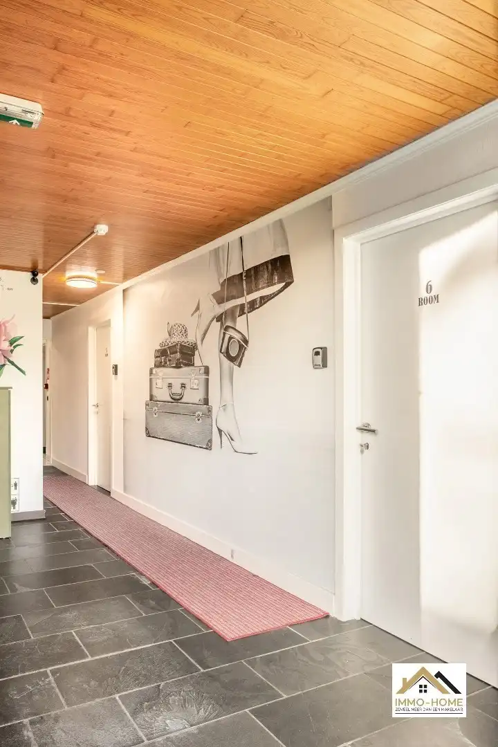 Zeer ruim gelijkvloers appartement met woonkelder en private tuin  foto 9