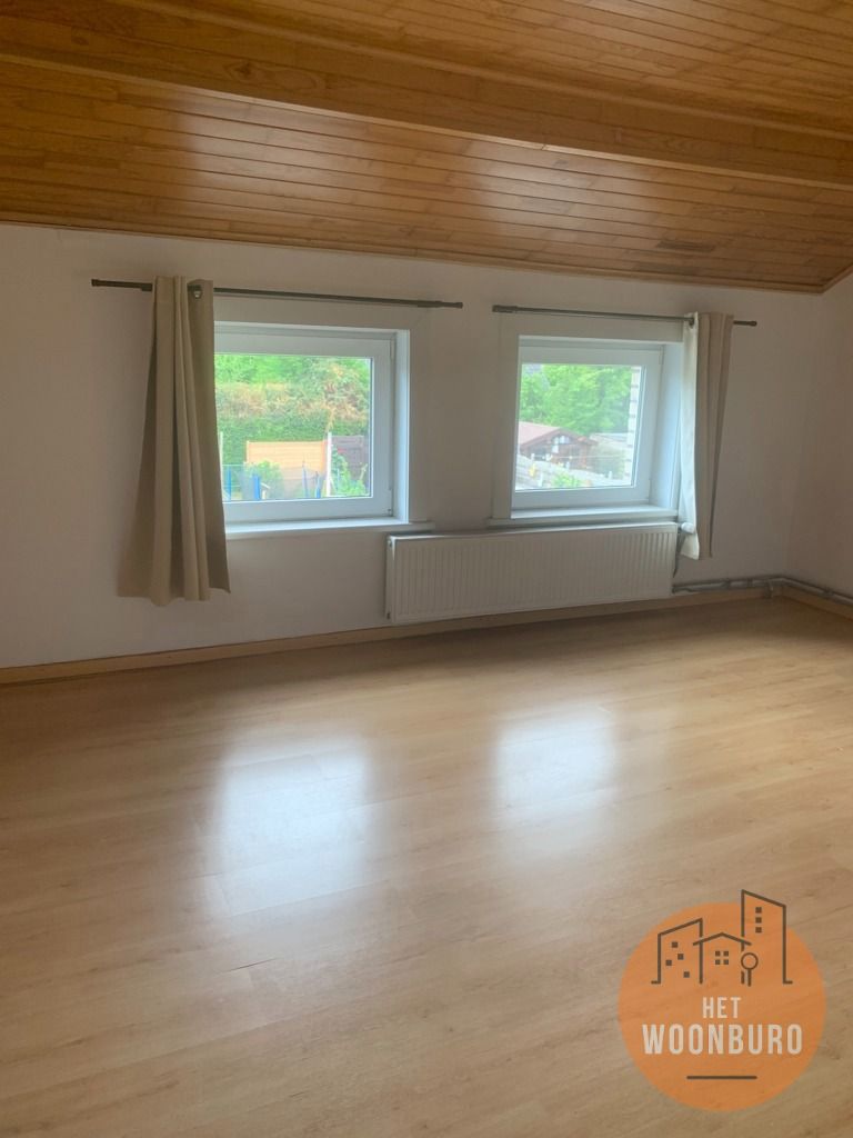 Rijwoning met garage en tuin foto 11
