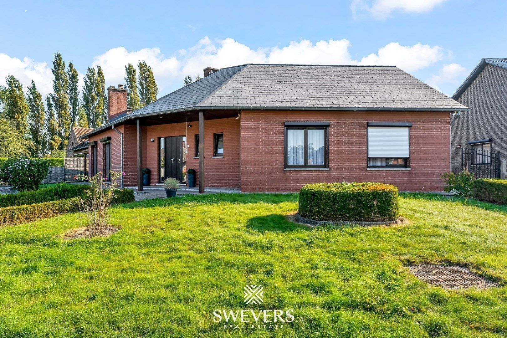 Instapklare gelijkvloerse woning met 3 slaapkamers en gezellige tuin in Borgloon foto 24
