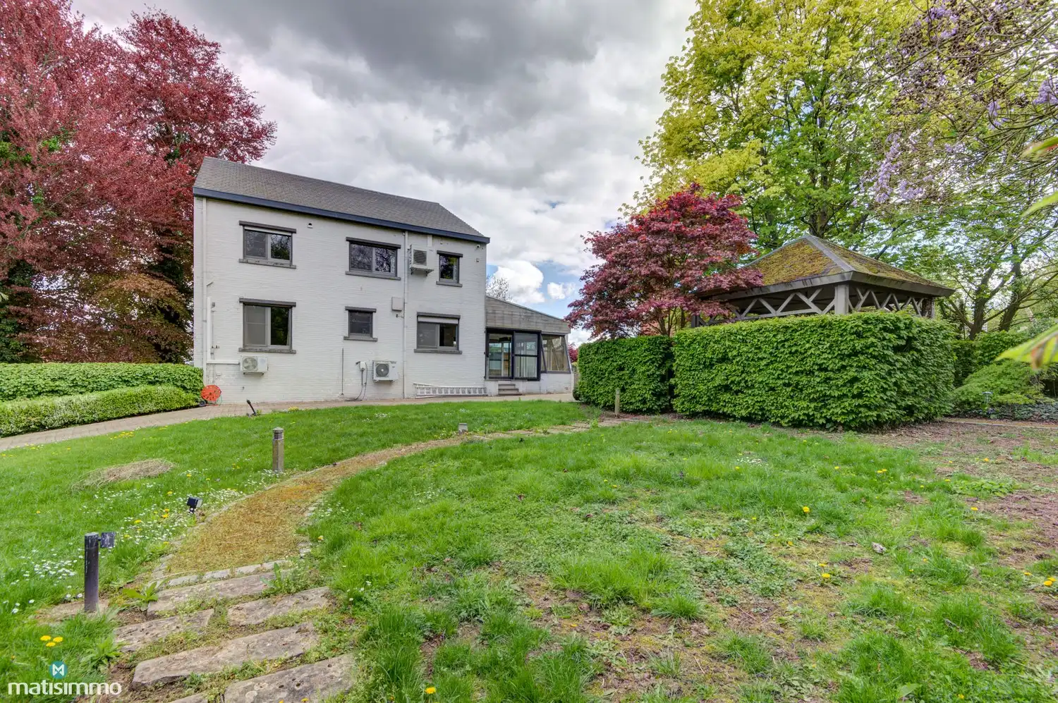 RUIME WONING MET 5 SLAAPKAMERS, INPANDIGE GARAGE EN WELLNESSRUIMTE OP EEN RUIM PERCEEL foto 51