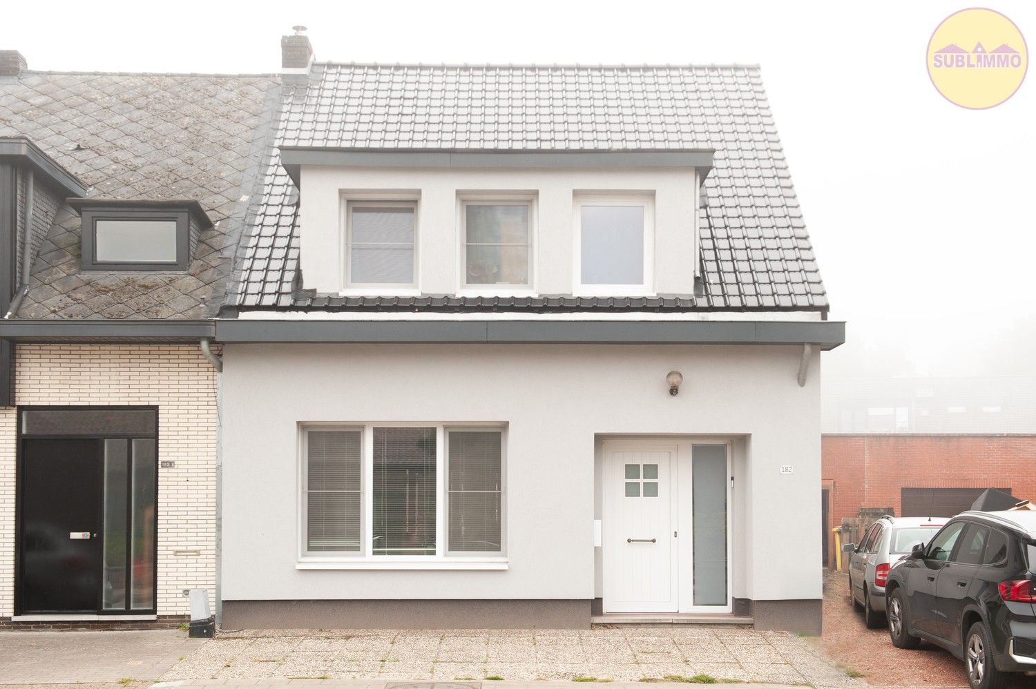 Hoofdfoto van de publicatie: Halfopen bebouwing met 3 slaapkamers op een perceel van 1.147 m²  in Mol.