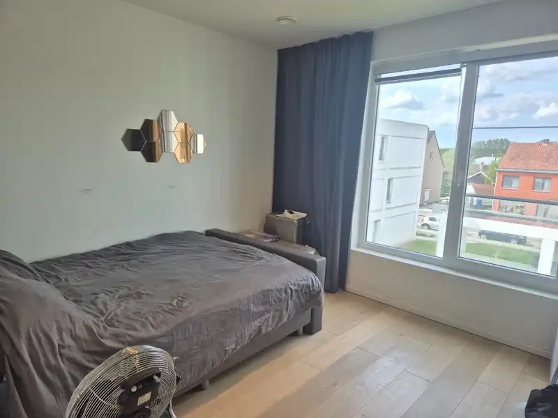 APPARTEMENT MET TERRAS EN AUTOSTAANPLAATS TE HUUR IN MOERBEKE foto 10