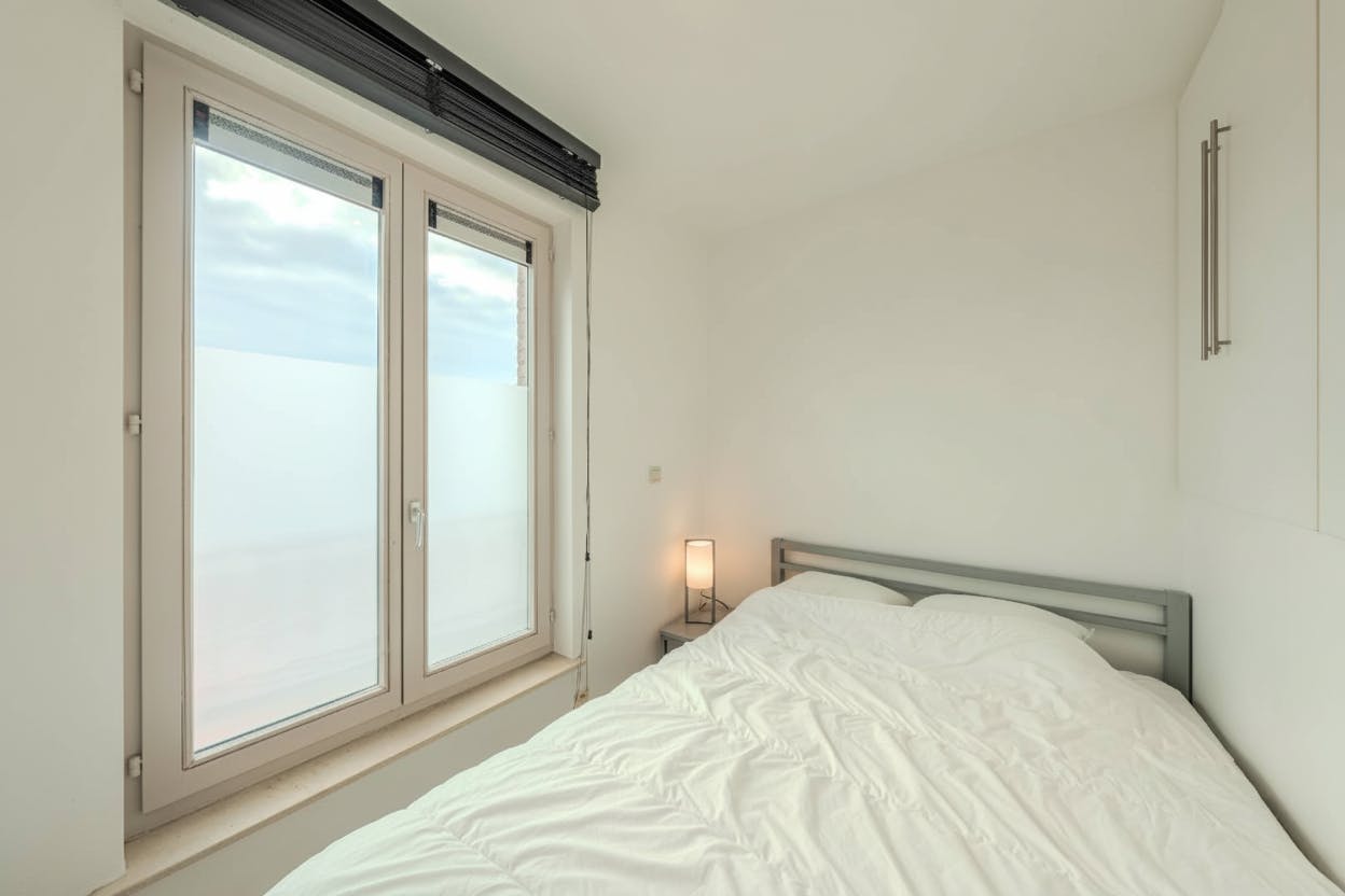 Lichtrijk duplex appartement met twee slaapkamers en groot terras! foto 12